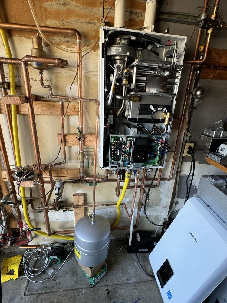 Licensed technician's tankless water heater installation in a Fort Lauderdale home